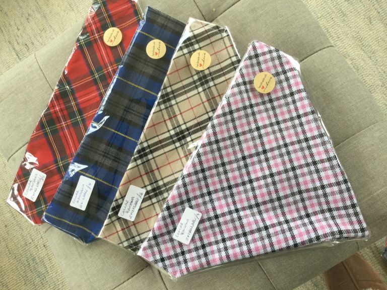 selection of hand made through the collar dog bandanas