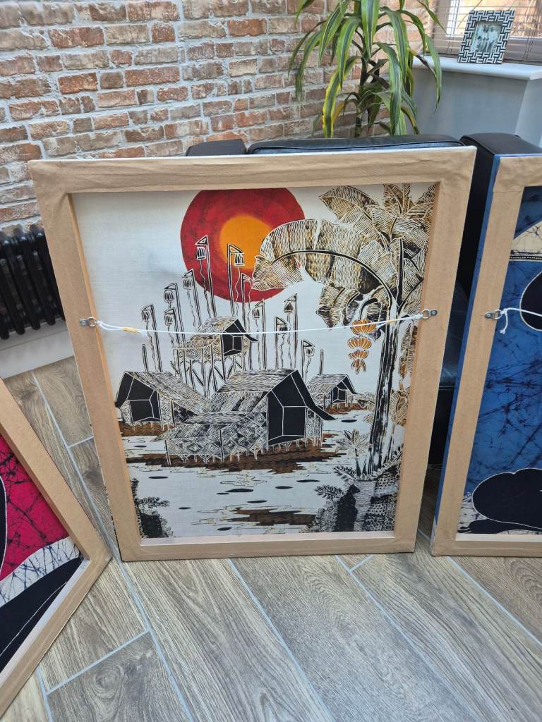 Four batik pictures on wooden frames