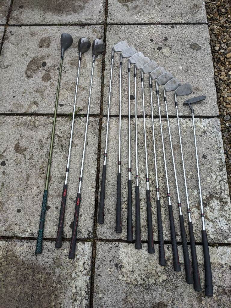 Wilson golf clubs, bag and trolley