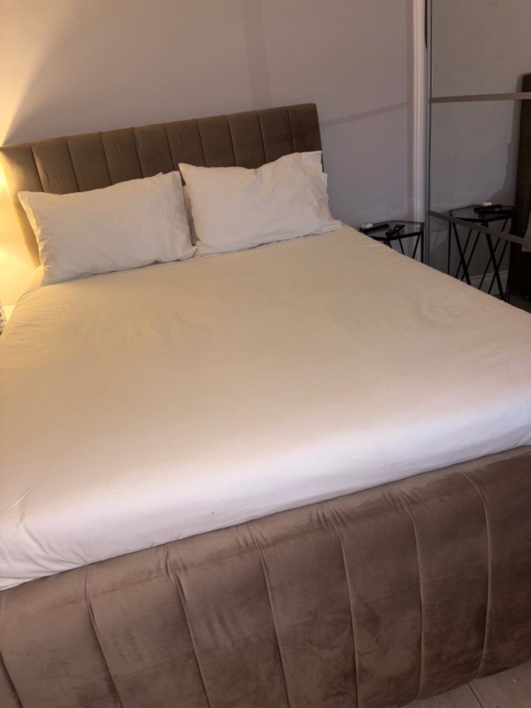 Kingsize ottoman storage bed with new mattress 