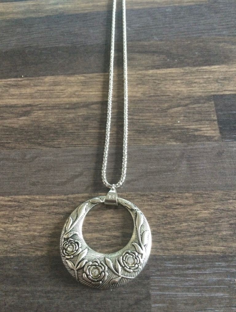 Horse & flower necklaces £5 each. Can post or collect from tq2