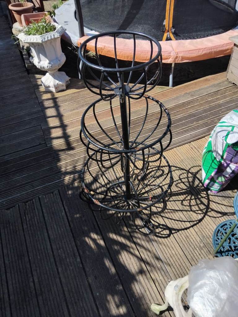 Black metal triple planter for garden