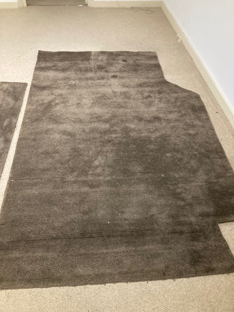 Two pieces of carpet used as rugs very good condition