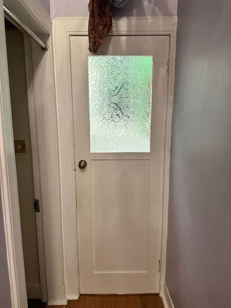 Glazed white painted door.  Free to collect asap