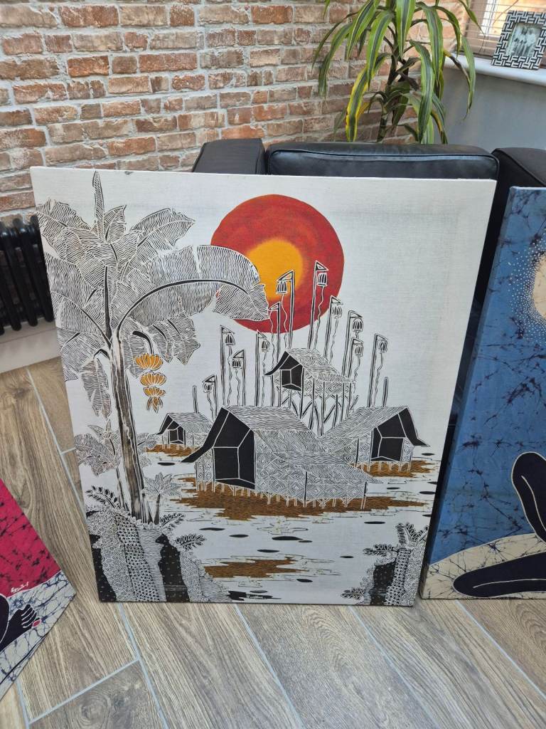 Four batik pictures on wooden frames