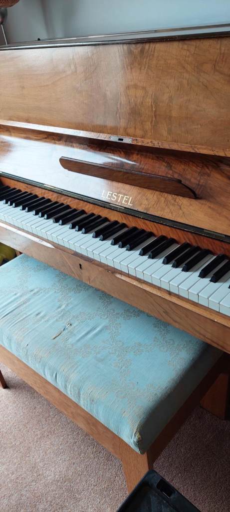 Upright piano - free! Beautiful to play. Attractive warm wood in good condition. Double piano stool 