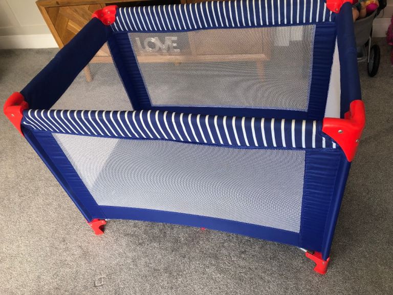 Red kite travel cot and 2 mattresses