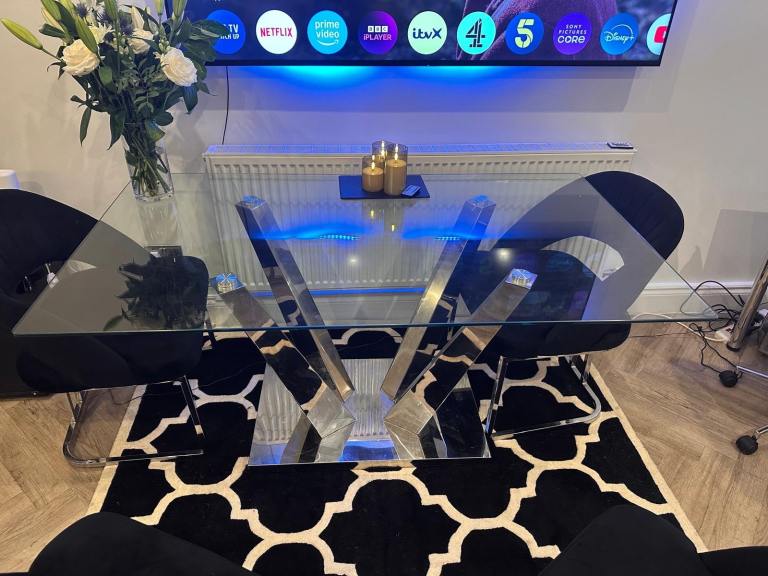modern glass dining table (Chairs not included*)