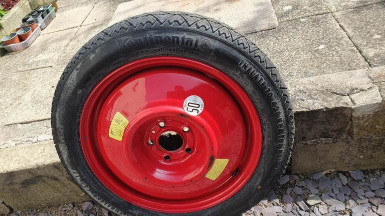 New temparary space saver continental tyre and rim 