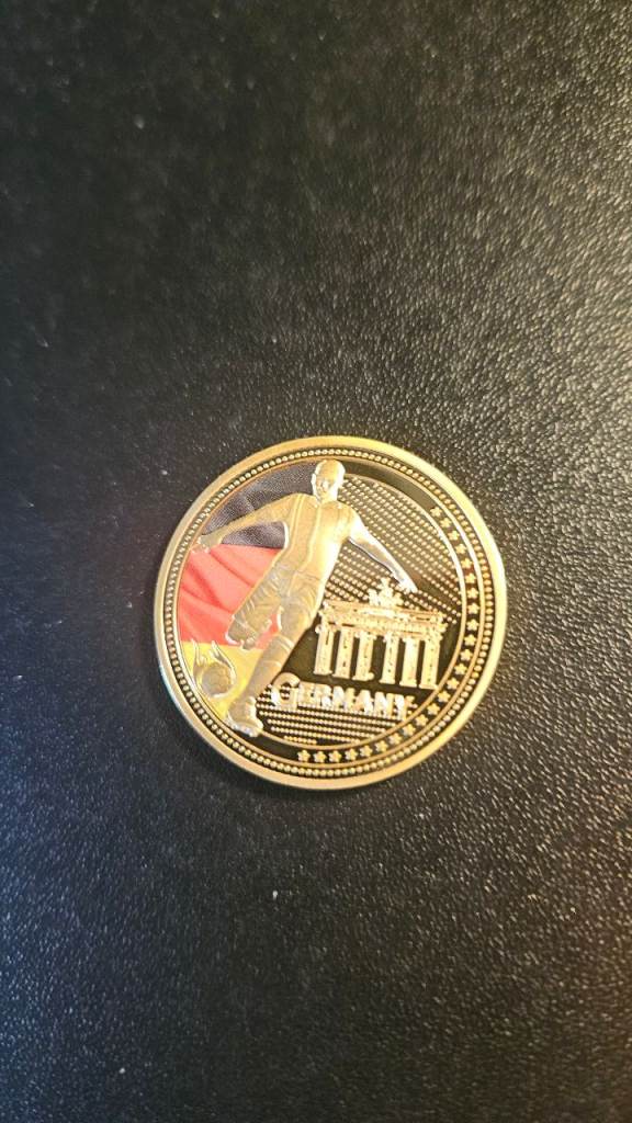 Gold plate football medal. ( Germany)