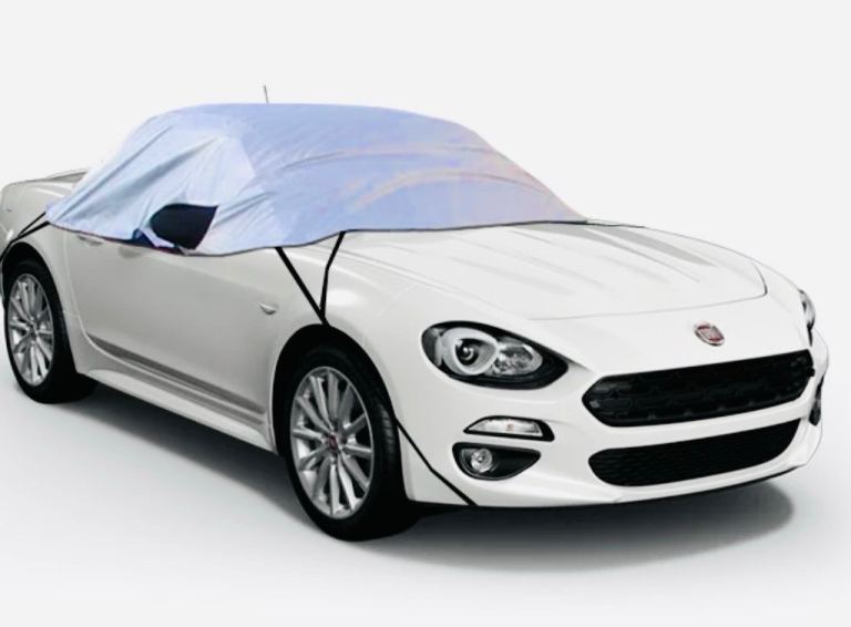 Convertible car cover. Canvas waterproofer & cleaner. And 2 cup holders.