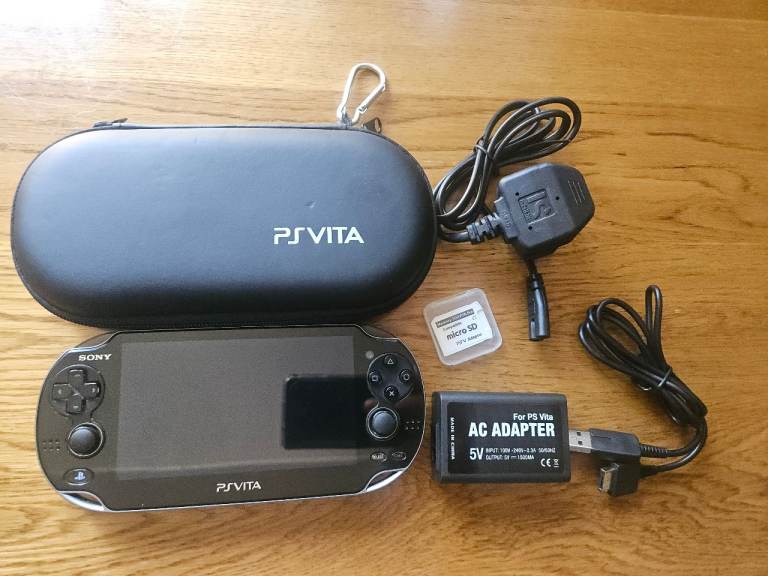 Sony PS Vita with 128GB Memory Card, Case & AC Adapter
