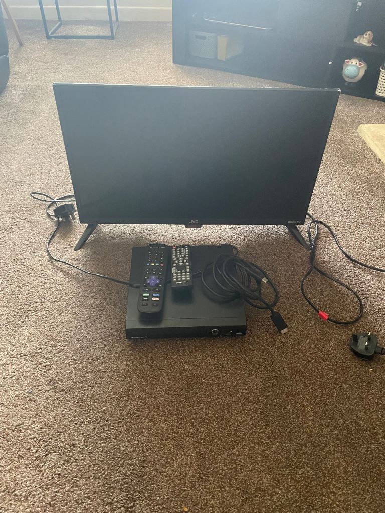 Roko 32 inch TV with built-in DVD player and remotes