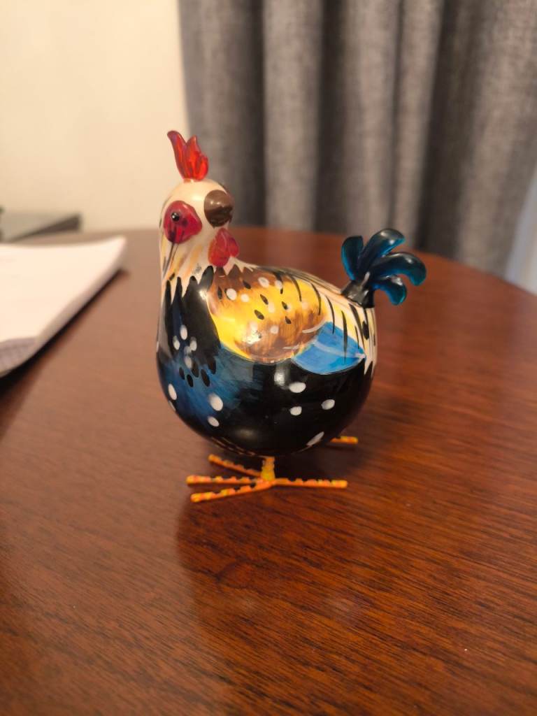 Chicken figurine rocking rooster 