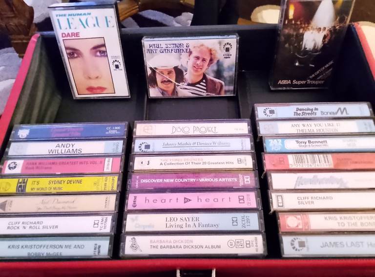 Case of audio cassettes Inc Simon and gatefunkel and human league etc