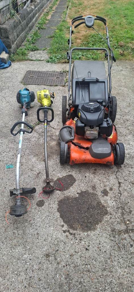 Two strimmers and 1 husqvarna lawnmower 