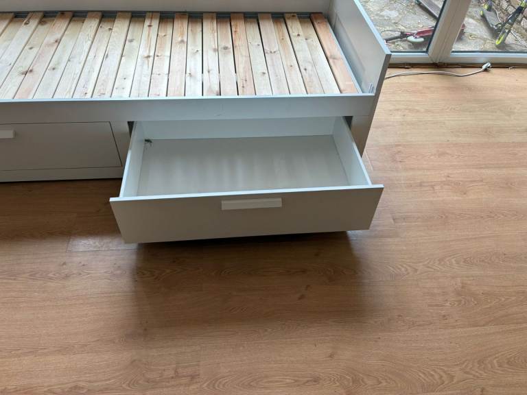 White Day Bed Frame with Two Storage Drawers, capacity to extend to king size.
