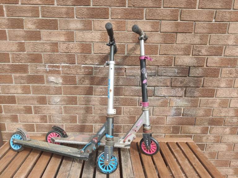 Two Kids Scooters – Used Condition, Blue and Pink Wheels