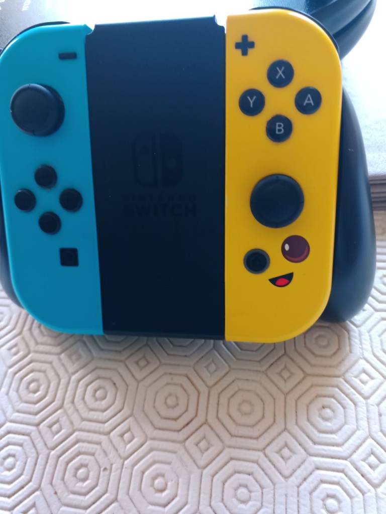 Nintendo Switch with Joy-Cons, Dock, and Hogwarts Legacy Case