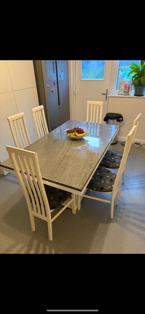 Dining table and 6 chairs 