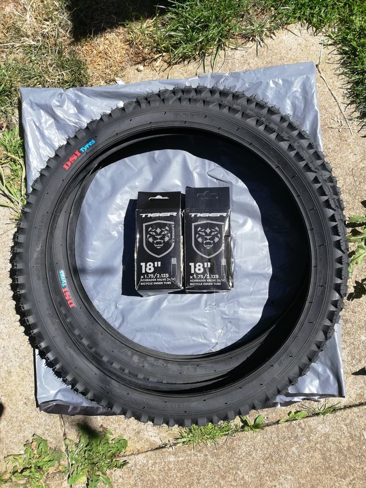  1 NEW PAIR 18 INCH MOUNTAIN BIKE INNER TUBES. AND 1 PAIR NEW MOUNTAIN BIKE TYRES