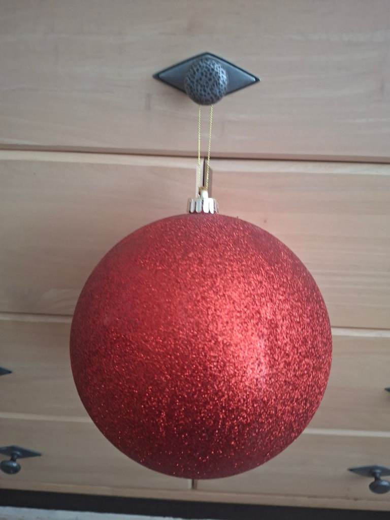 Giant red hanging bauble