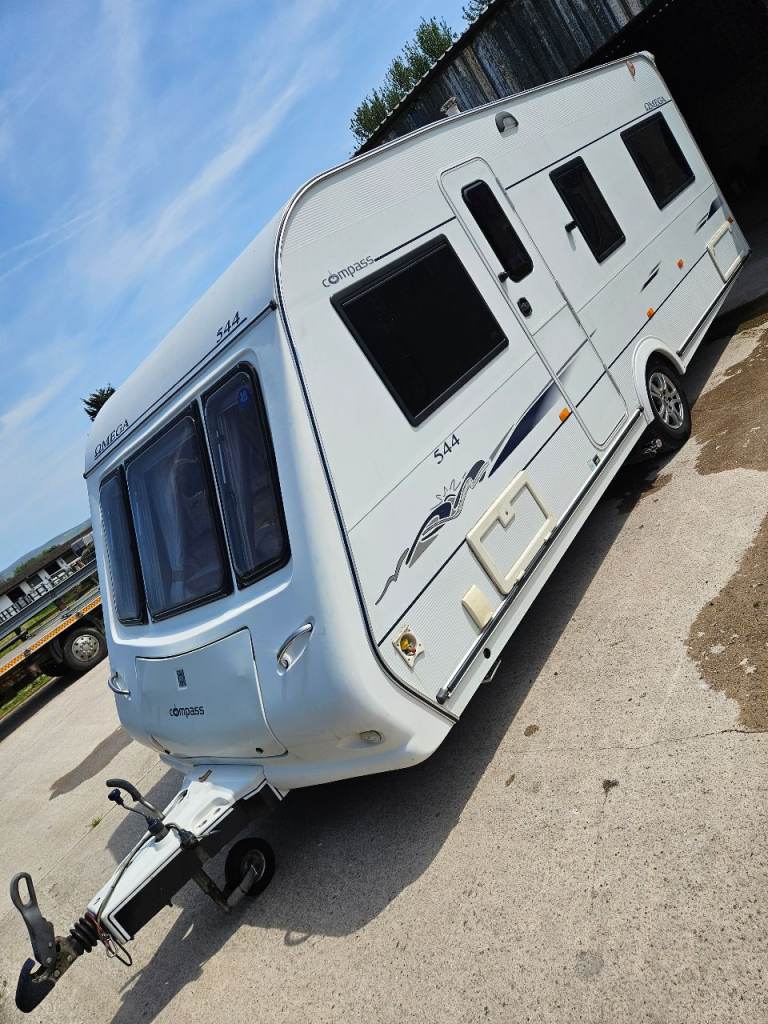 Four berth fixed bed caravan with awnings, motor mover and accessories 