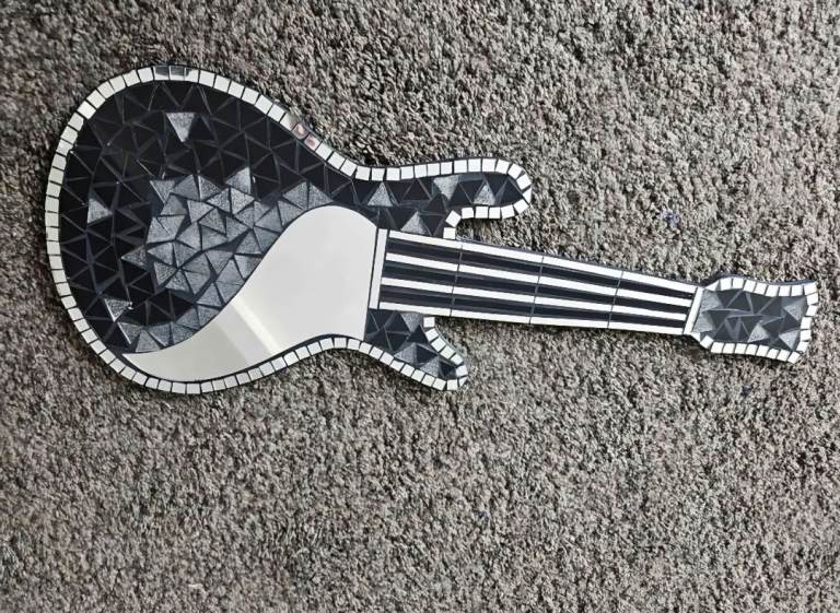 Guitar shaped mirror