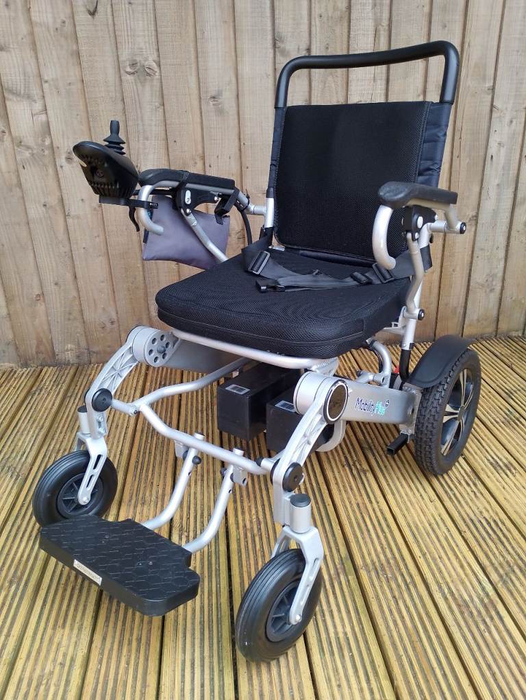 Mobility Plus Ultra Lightweight Instafold Power Wheelchair VGC with one battery/charger and manual.