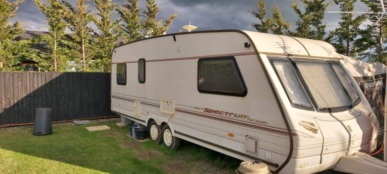 Touring caravan with awning