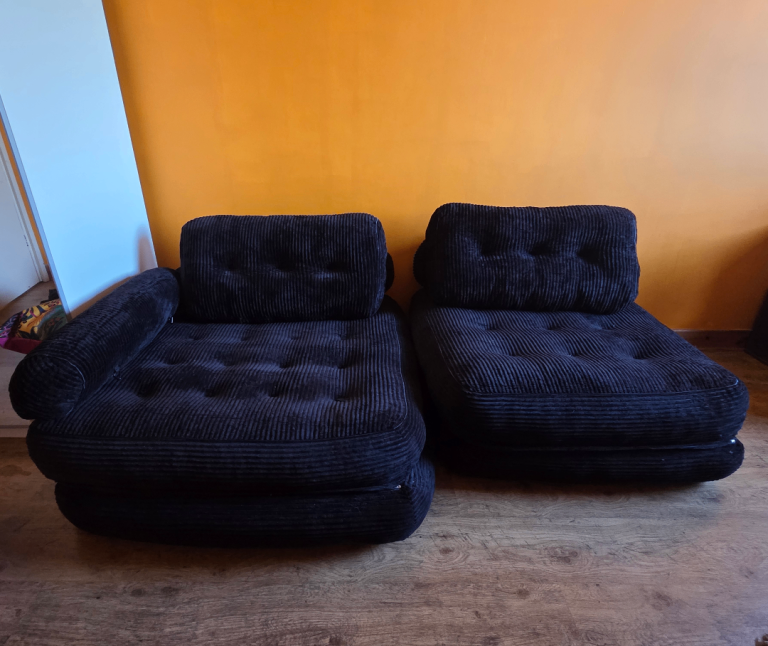 Foam futon-style fold out sofabed chairs (1 large, 1 small)