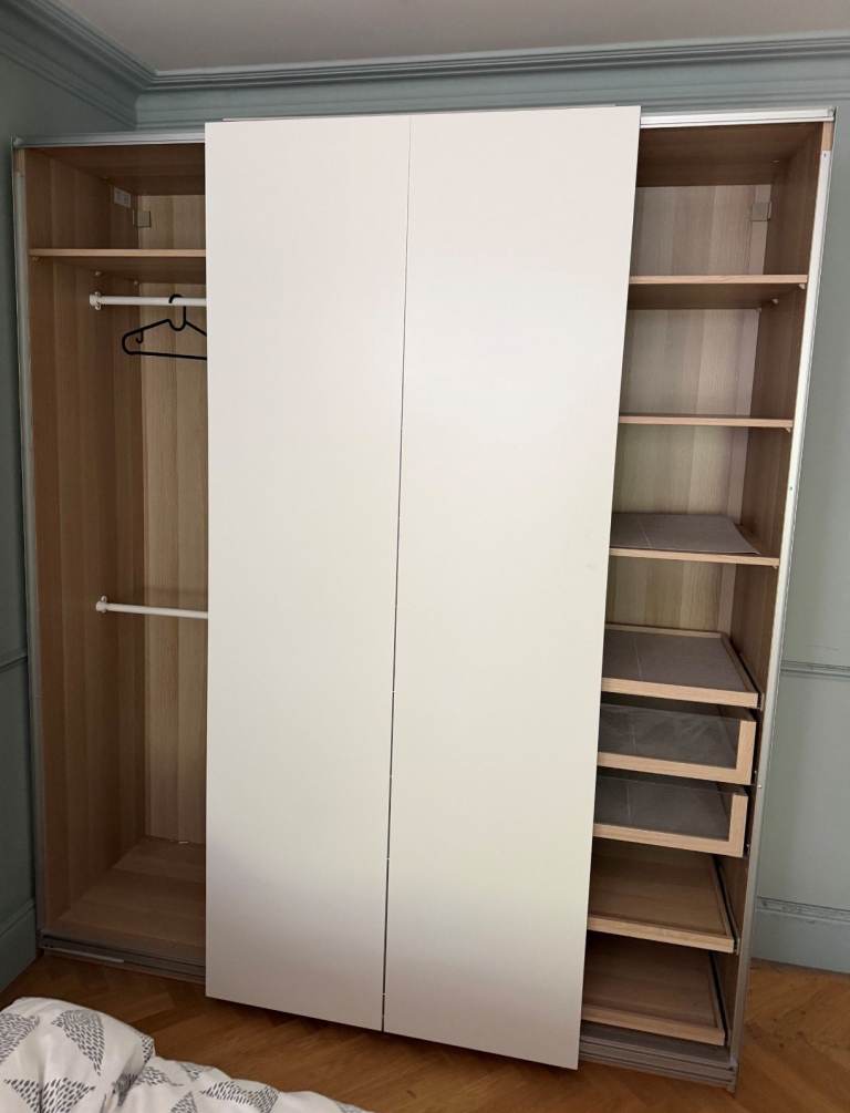 2 years old IKEA wardrobe w/sliding doors and 2 m wide
