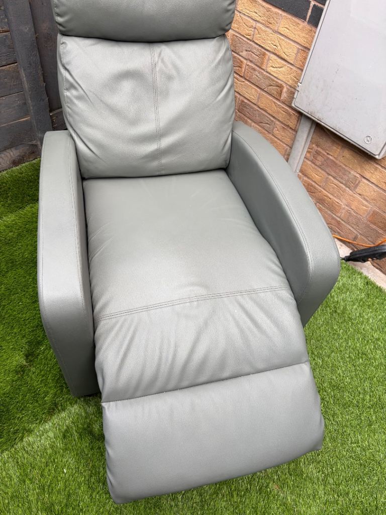 Grey faux leather manual reclining armchair 