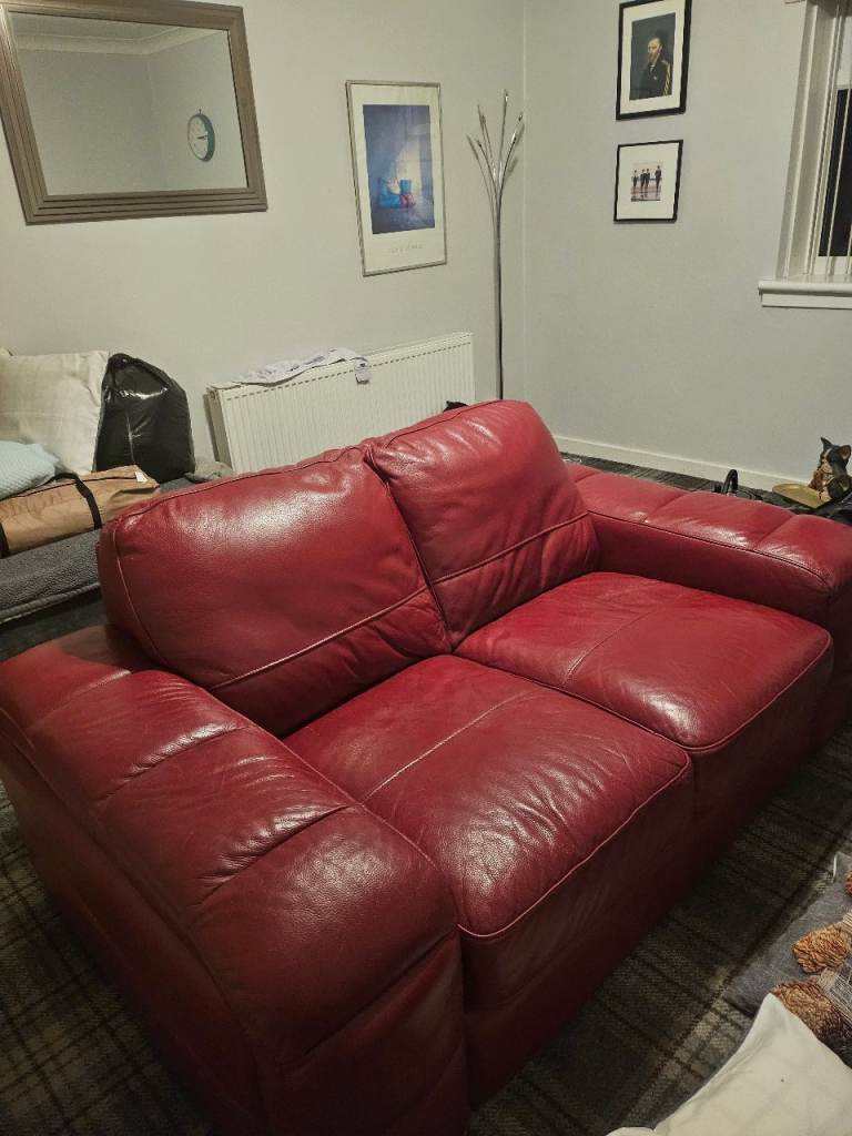 Red Leather Two-Seater Sofa – Good Condition