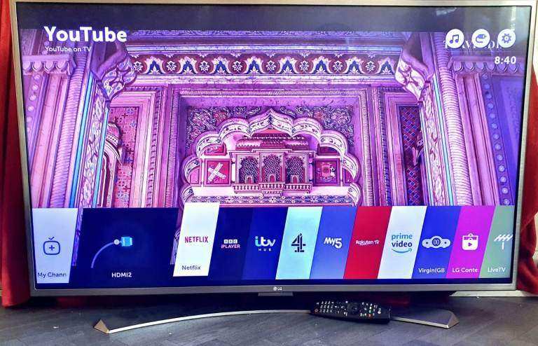 LG 49UH668V Smart 4k Ultra HD HDR 49" LED TV with stand magic remote