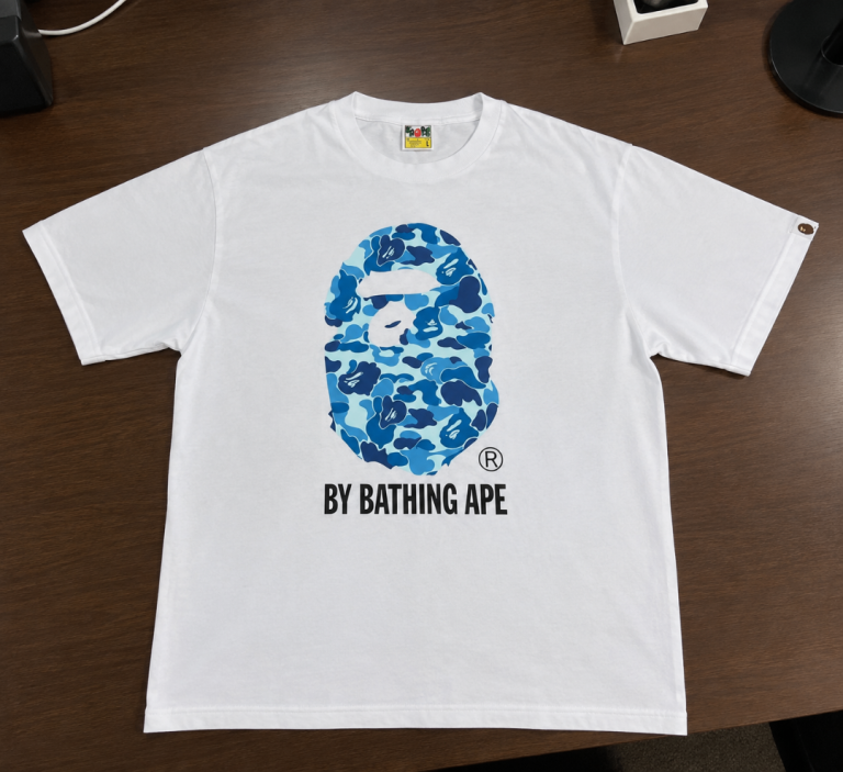 BAPE White T-Shirt with Blue Camo Logo – As Good As New