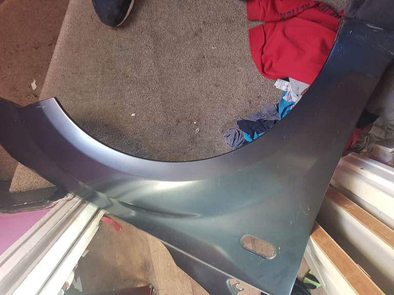 Passanger side wing for a 2007/2008 ford focus 