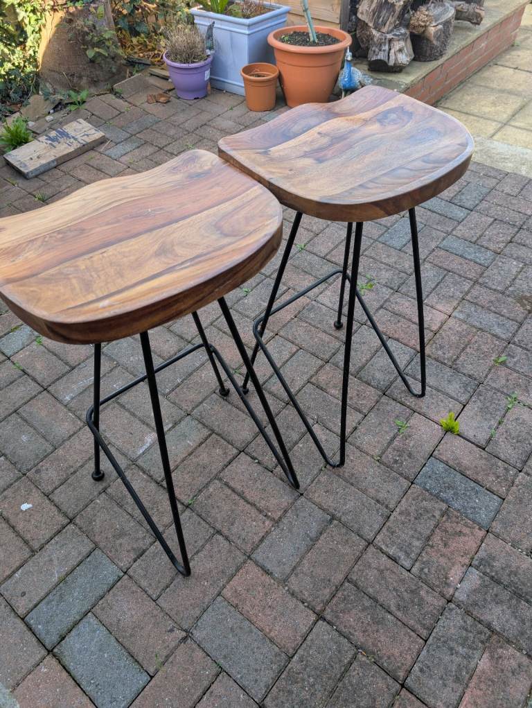 2 wooden stools with metal legs