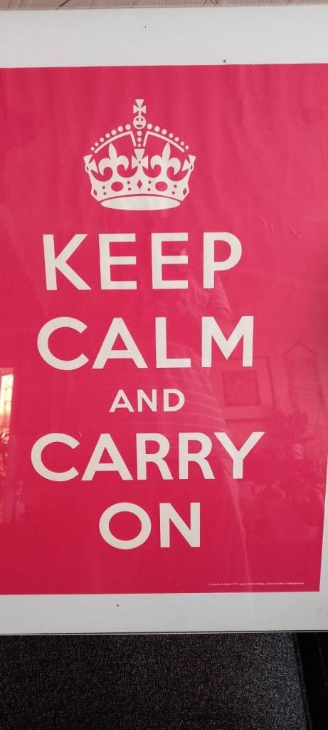 Keep Calm And Carry On Poster Mounted On A Clear Plastic Frame