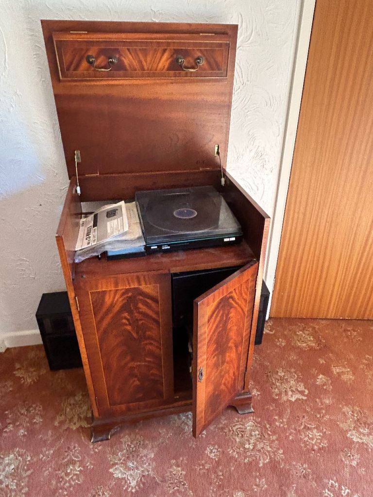 Dark wood record player cabinete