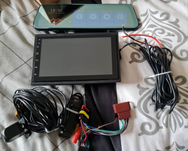 Multi media touch screen head unit with front and rear cameras