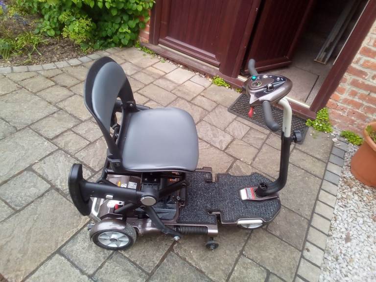 TGA Minimo folding mobility scooted.