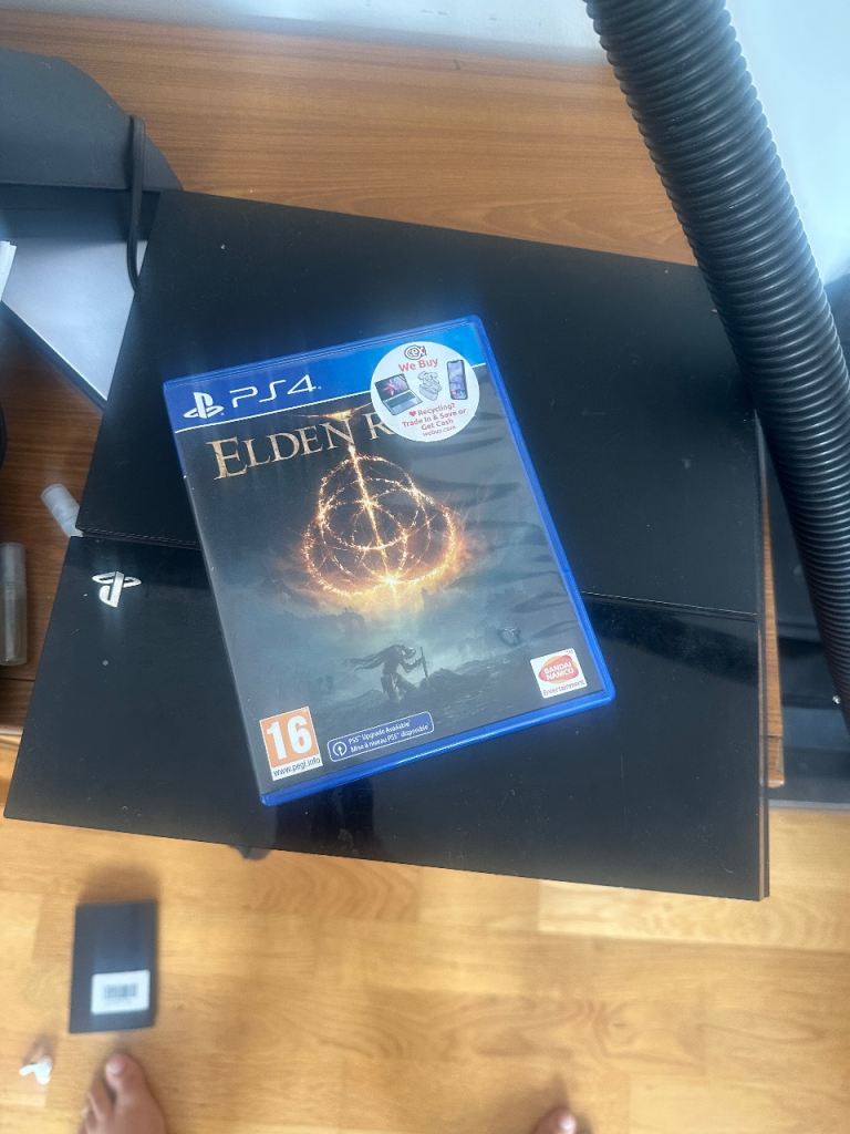 PS4 with Elden Ring Game and Controller