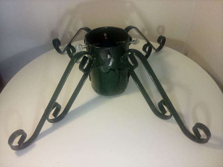 Metal Christmas Tree Holder with Scroll Legs.