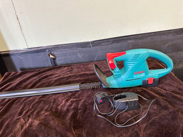 Bosch Cordless Hedge Trimmer with Charger – Good Condition