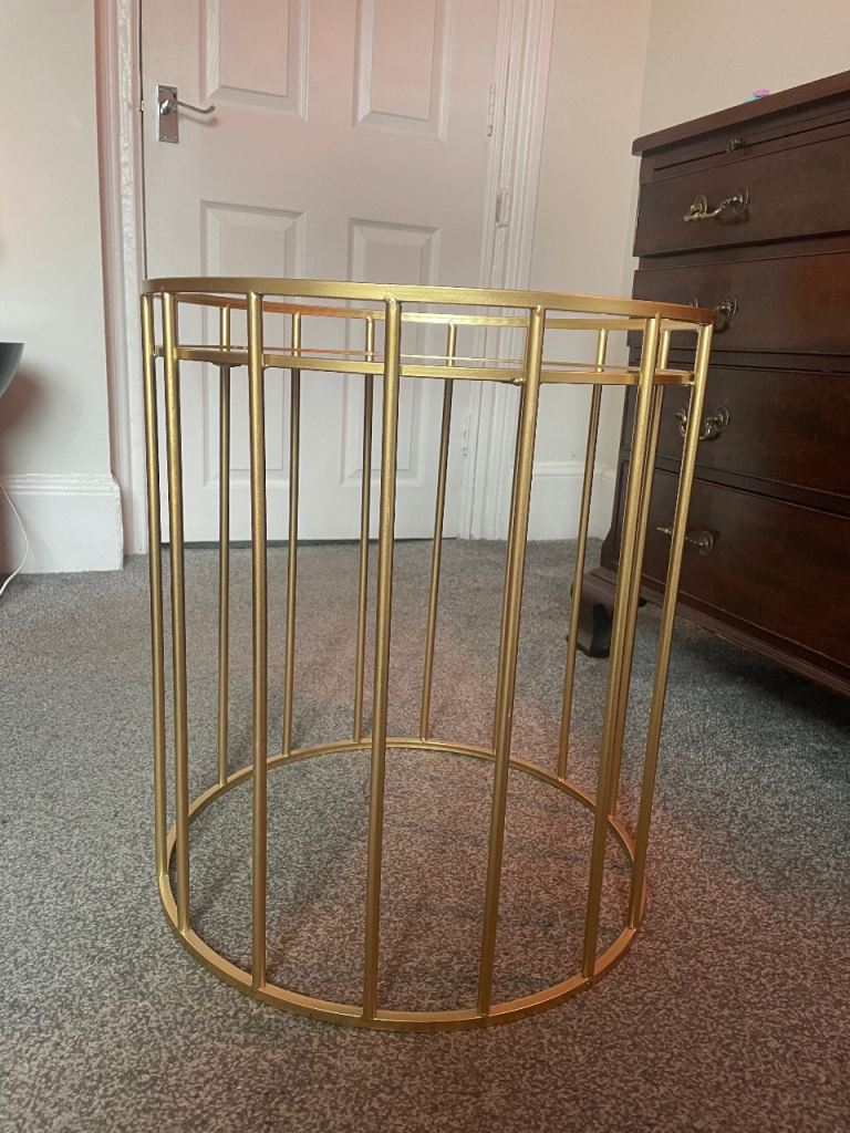 Golden mirrored round coffee table