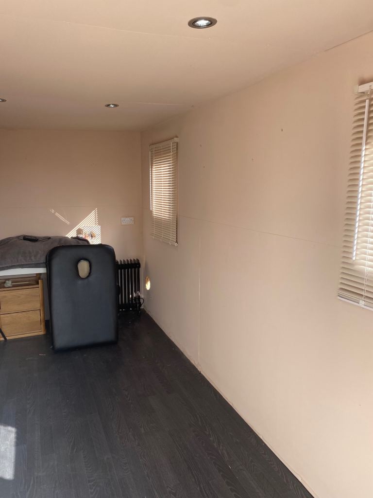 Shed log cabin insulated spit lights flooring used as a salon 