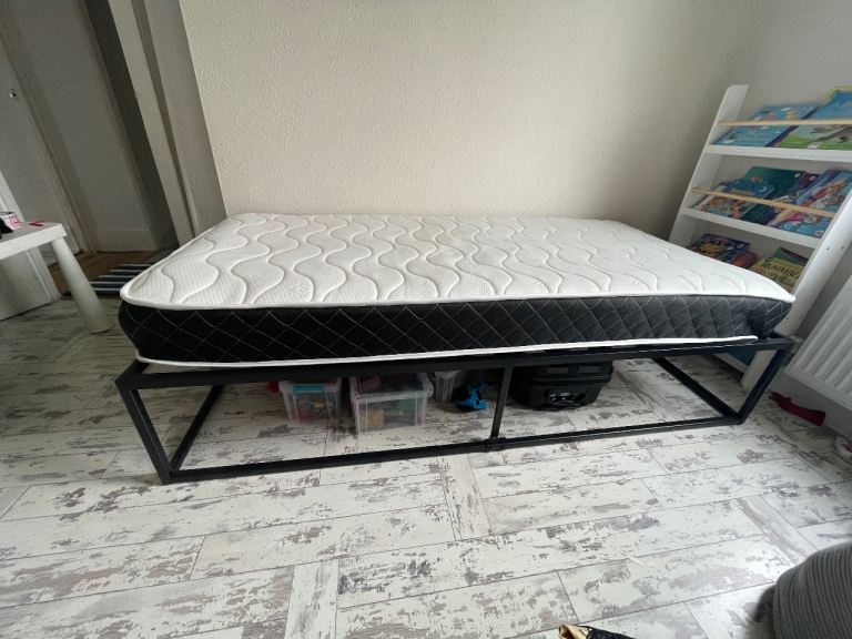 Single bed- and mattress- used few times 