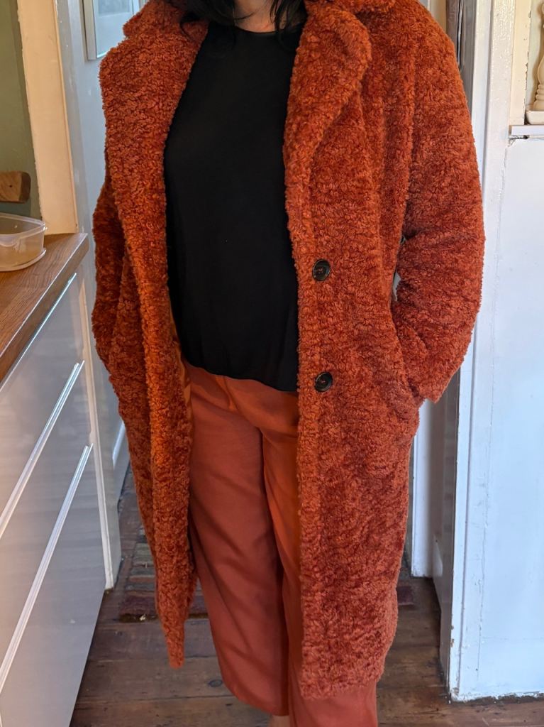 Orange coats x 2  size 14