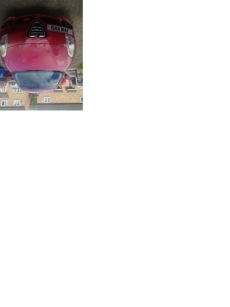 Red alpha romeo gulietta 